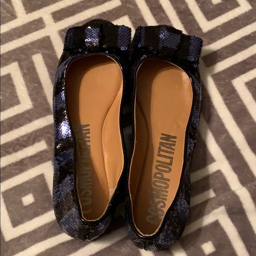 Cosmopolitan blue and black sequin flats.